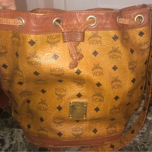 MCM Bags Mcm Drawstring Bucket Bag Cognac Leather Some Wear Around